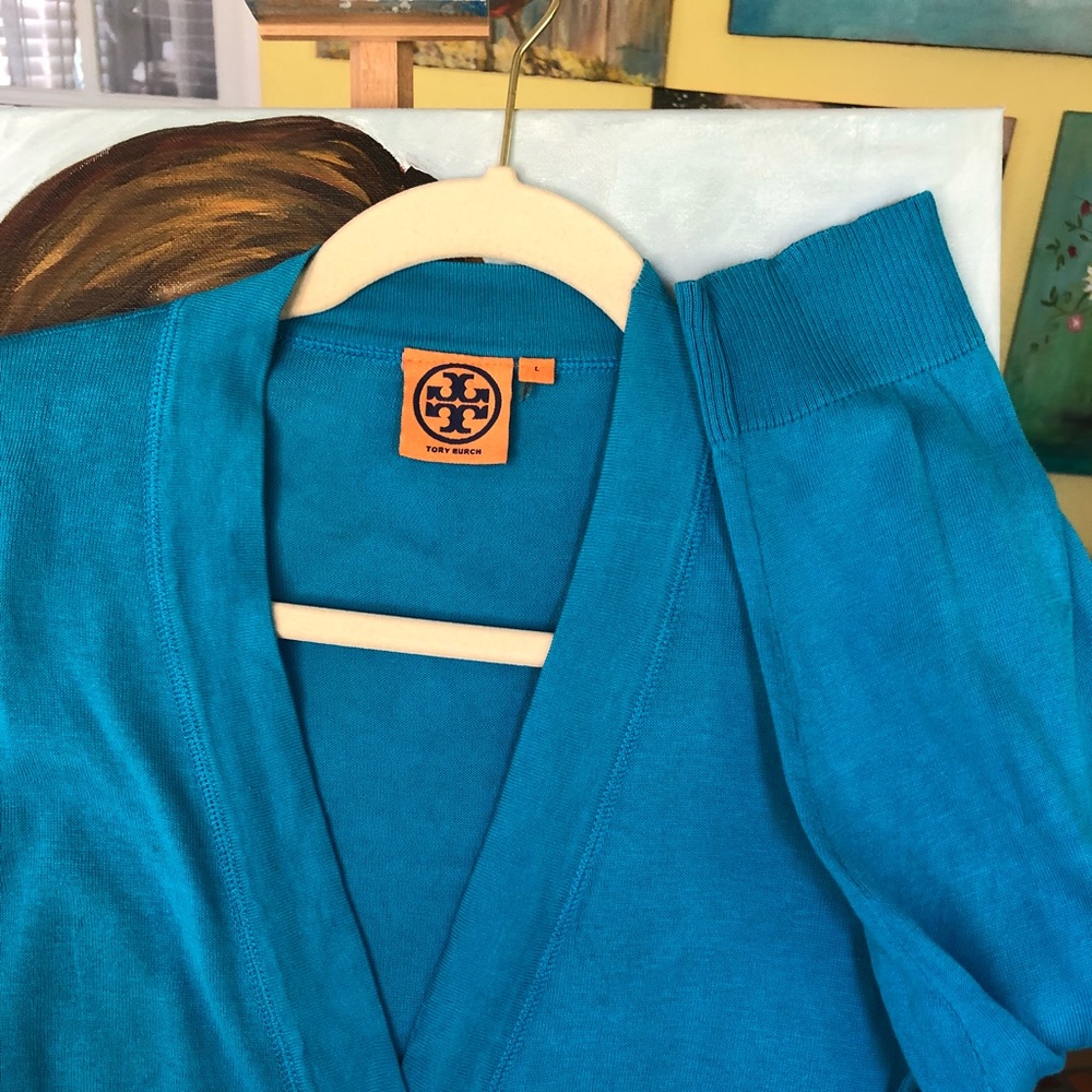 Tory Burch cardigan in deep blue.